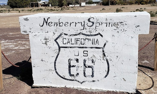 Stone Route 66 sign in Newberry Springs, California
