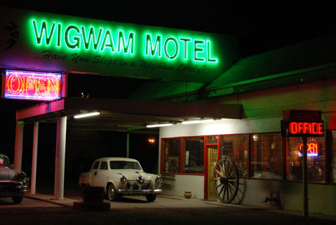 The Wigwam Motel in Holbrook, Arizona, at night, with Mr. Lewis' Studebaker