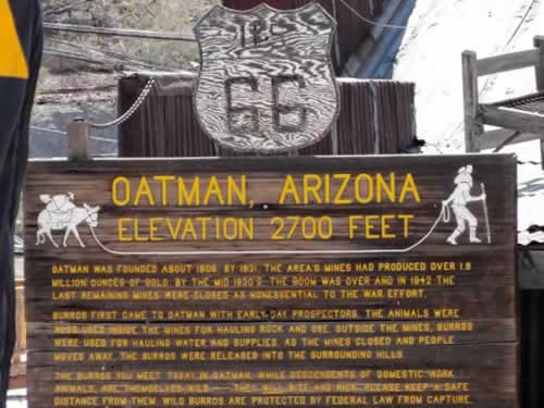 Route 66 travel sign in Oatman, Arizona, elevation 2,700 feet