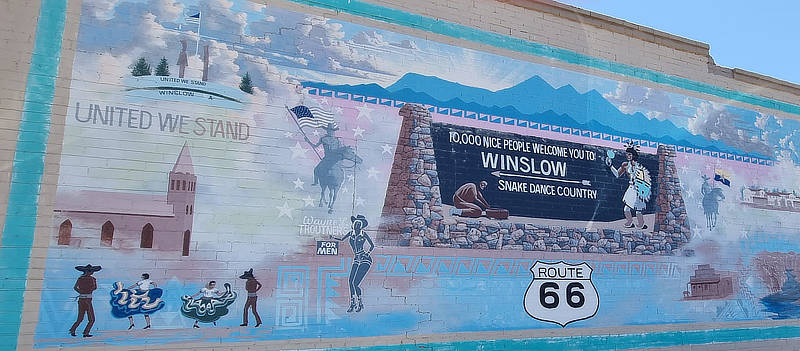 The "10,000 nice people welcome you to Winslow ... Snake Dance Country" mural in Winslow, Arizona