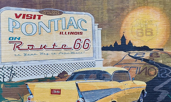 The Visit Pontiac Illinois on Route 66 mural, with the yellow 1957 Chevrolet BelAir