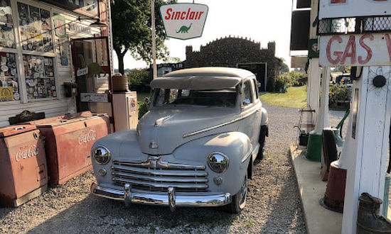 The famous car at Gary's Gay Parita Sinclair Filling Station near Halltown, Missouri