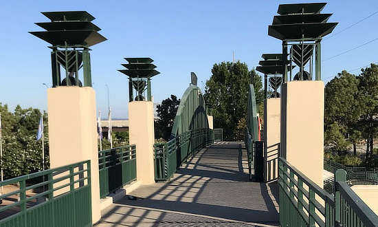 Walking over the Skyway connecting the Cyrus Avery Centennial Plaza with the parking lot