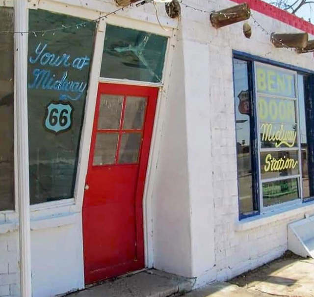 The famous red Bent Door at the Midway Station on Route 66 in Adrian, Texas