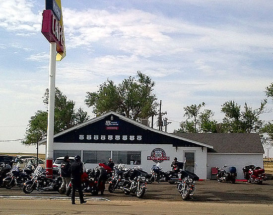 Motorcycles stopped at the Midpoint Cafe in Adrian, Texas on Historic US Route 66