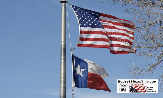 American flag and Texas flag flying proudly at Palo Duro Canyon State Park, near Amarillo, Texas and Historic US Highway 66