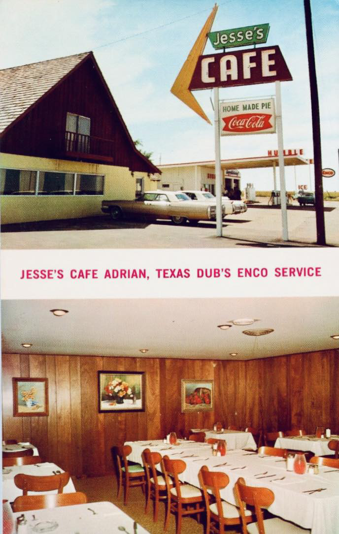 Vintage picture postcard of Adrian, showing Jesse's Cafe and Dub's Enco Service Station